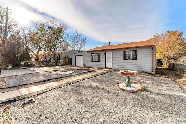 ranch-style home with a garage