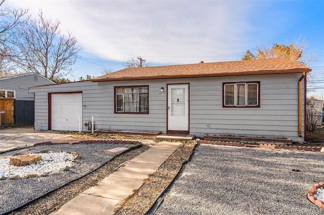 single story home featuring a garage