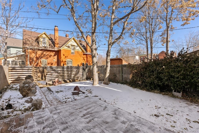 view of snow covered patio