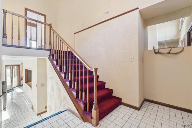 stairs with a high ceiling