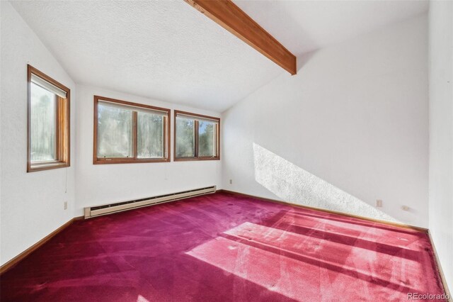 carpeted spare room featuring vaulted ceiling with beams, a textured ceiling, and a baseboard radiator