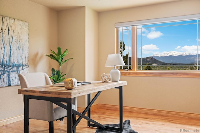 13909 Stone Chimney Ln, Pine, CO 80470 - office featuring a mountain view and wood finished floors