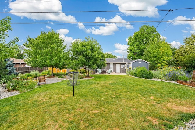6066 Simms St, Arvada, CO 80004 - view of yard featuring a patio and a garden
