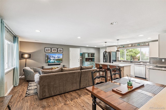 6066 Simms St, Arvada, CO 80004 - living room with wood finished floors and recessed lighting