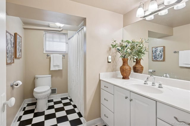 2201 Cherry St, Denver, CO 80207 - full bath with tile patterned floors, vanity, and a shower with shower curtain