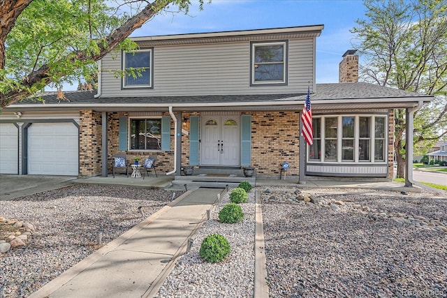 18263 E Mansfield Ave, Aurora, CO 80013 - traditional-style house with covered porch, brick siding, a chimney, concrete driveway, and a garage