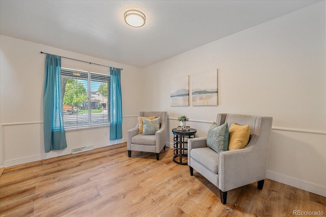 18263 E Mansfield Ave, Aurora, CO 80013 - living area featuring wood finished floors and baseboards