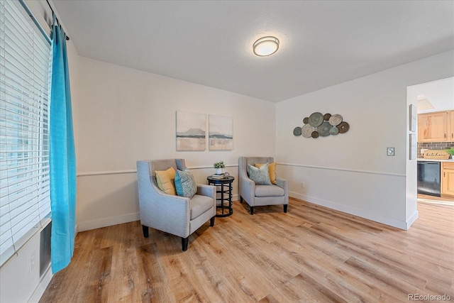 18263 E Mansfield Ave, Aurora, CO 80013 - living area featuring light wood finished floors and baseboards