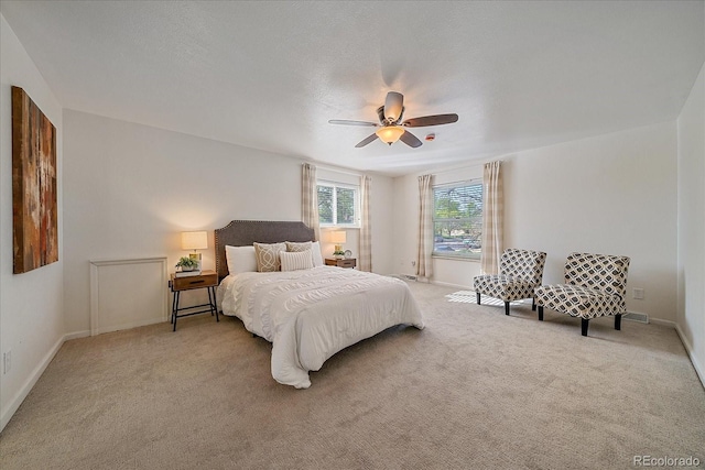 18263 E Mansfield Ave, Aurora, CO 80013 - carpeted bedroom featuring baseboards and ceiling fan