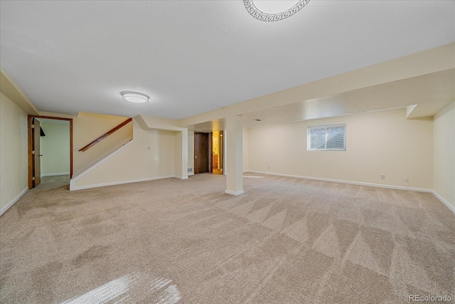 18263 E Mansfield Ave, Aurora, CO 80013 - basement featuring carpet floors, baseboards, and stairway