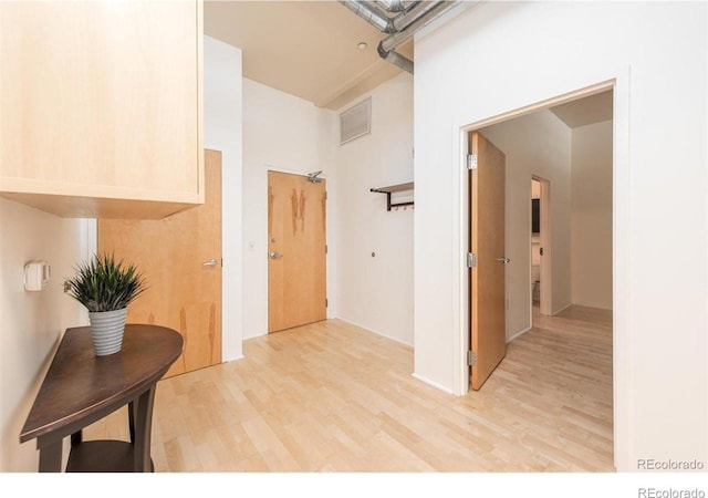 3100 Huron St Unit 3P, Denver, CO 80202 - hall with light wood finished floors