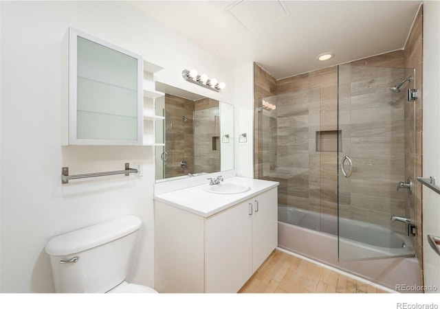 3100 Huron St Unit 3P, Denver, CO 80202 - bathroom featuring  shower combination, vanity, wood finished floors, and recessed lighting