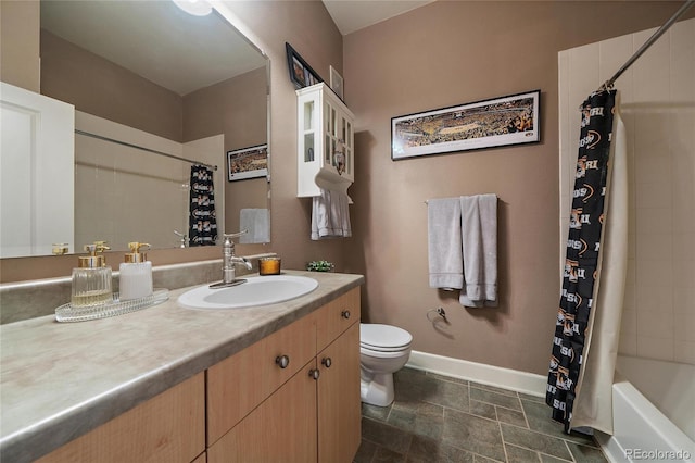 full bathroom featuring shower / bath combo, baseboards, vanity, and toilet