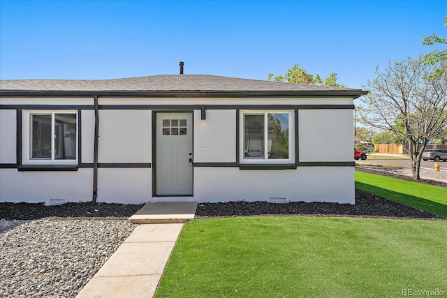3206 Elizabeth St, Denver, CO 80205 - ranch-style house featuring a front lawn, a shingled roof, and crawl space
