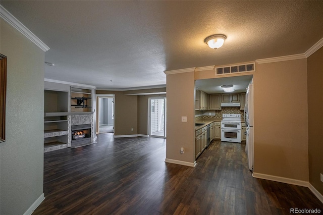 12208 W Dorado Pl Unit 207, Littleton, CO 80127 - kitchen featuring range with two ovens, dark wood-style flooring, under cabinet range hood, ornamental molding, and open floor plan