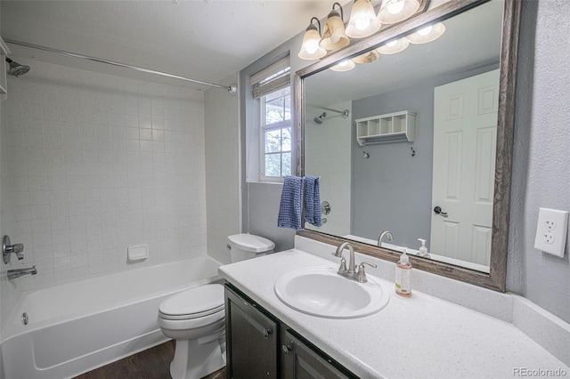 12208 W Dorado Pl Unit 207, Littleton, CO 80127 - bathroom with bathing tub / shower combination, vanity, and wood finished floors