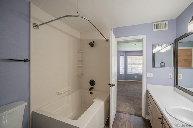 12208 W Dorado Pl Unit 207, Littleton, CO 80127 - full bath featuring  shower combination, vanity, and wood finished floors