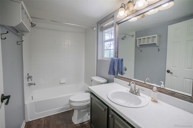 12208 W Dorado Pl Unit 207, Littleton, CO 80127 - bathroom featuring washtub / shower combination, vanity, and wood finished floors
