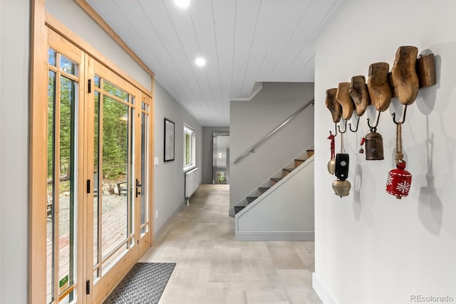 592 Brook Dr, Idaho Springs, CO 80452 - entryway with recessed lighting, stairway, wood ceiling, light flooring, and crown molding