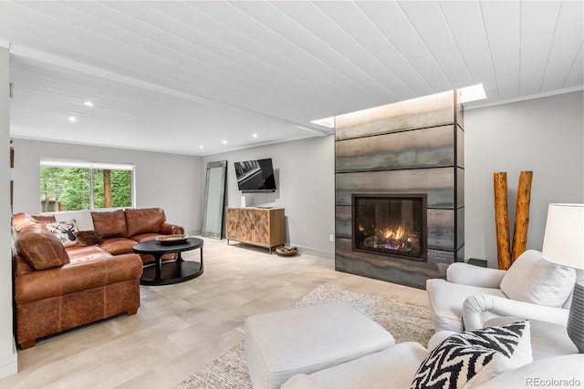 592 Brook Dr, Idaho Springs, CO 80452 - living area with wood finished floors, recessed lighting, and a large fireplace