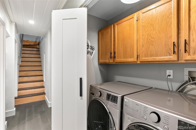 592 Brook Dr, Idaho Springs, CO 80452 - washroom with cabinet space, washer and clothes dryer, wood finished floors, and recessed lighting