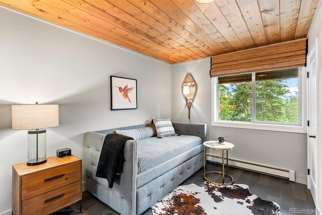592 Brook Dr, Idaho Springs, CO 80452 - bedroom featuring baseboard heating, wooden ceiling, and dark wood-style floors