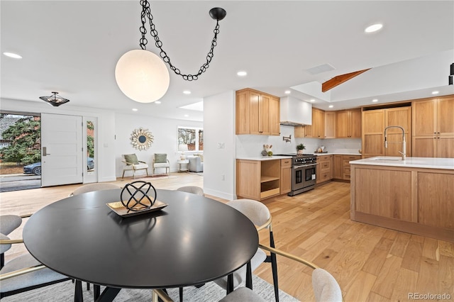456 Cherry St, Denver, CO 80220 - dining space with light wood-type flooring, recessed lighting, baseboards, and vaulted ceiling