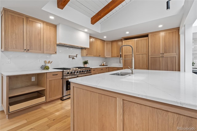 456 Cherry St, Denver, CO 80220 - kitchen with range with two ovens, a sink, custom exhaust hood, wood ceiling, and light wood-style floors