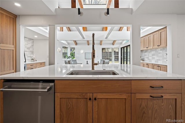 456 Cherry St, Denver, CO 80220 - kitchen with stainless steel dishwasher, open floor plan, backsplash, and a sink