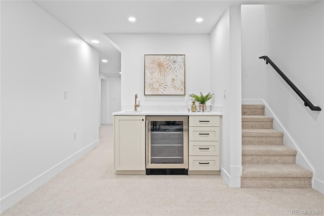 456 Cherry St, Denver, CO 80220 - indoor wet bar with beverage cooler, recessed lighting, light carpet, baseboards, and stairs