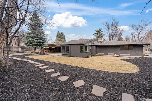 456 Cherry St, Denver, CO 80220 - rear view of house with brick siding and a patio