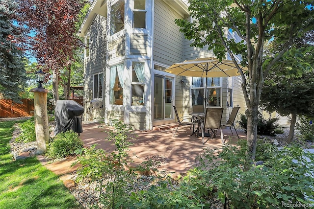 back of house featuring a patio