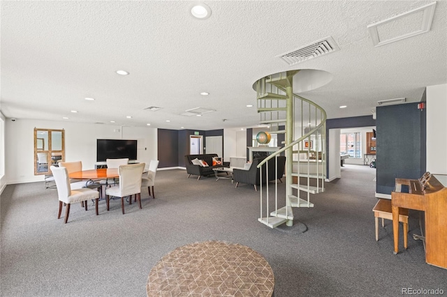 555 E 10th Ave Unit 111, Denver, CO 80203 - dining area featuring stairs, recessed lighting, a textured ceiling, baseboards, and attic access