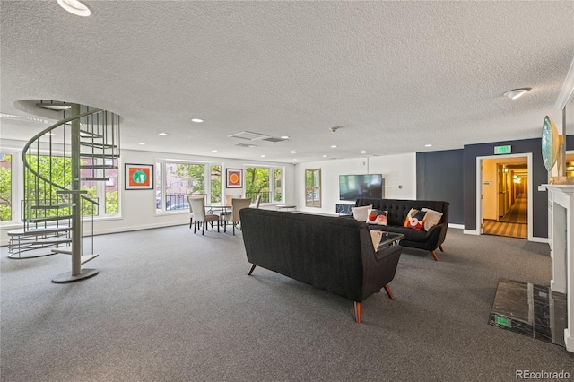 555 E 10th Ave Unit 111, Denver, CO 80203 - living room featuring carpet flooring, a textured ceiling, baseboards, and recessed lighting