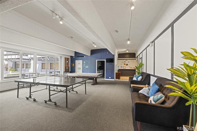 555 E 10th Ave Unit 111, Denver, CO 80203 - game room featuring track lighting, carpet flooring, a textured ceiling, and baseboards