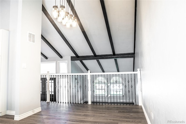 interior space featuring beam ceiling, high vaulted ceiling, dark wood-type flooring, and an inviting chandelier