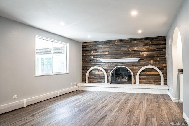 interior space featuring a fireplace and hardwood / wood-style flooring