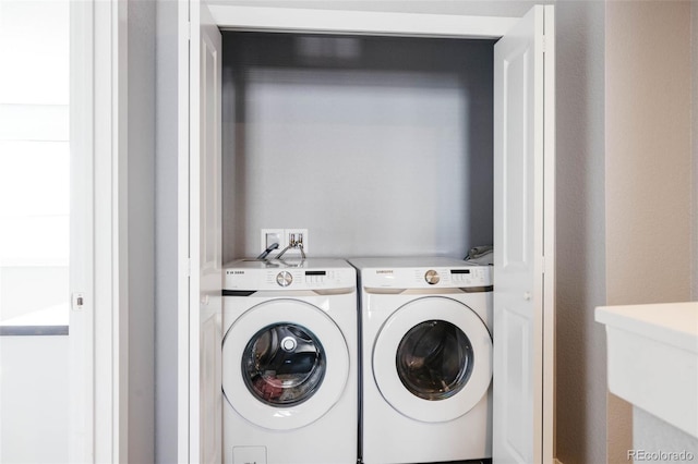 laundry room with washer and dryer