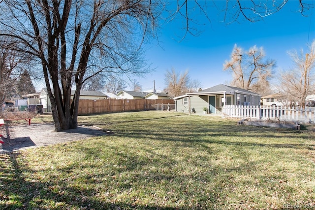 view of yard featuring a fenced backyard