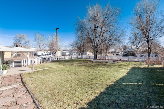 view of yard with a patio area and fence