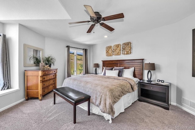 carpeted bedroom with ceiling fan