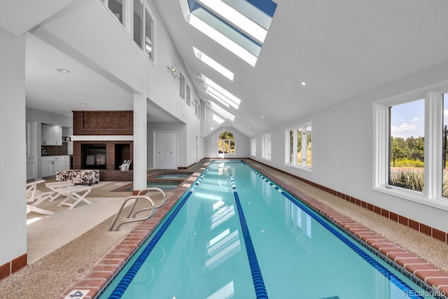 view of pool featuring a skylight