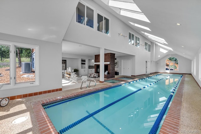 view of pool with a skylight