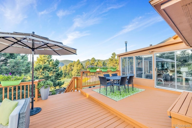 wooden terrace featuring a mountain view