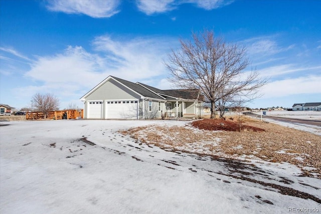 ranch-style home with a garage