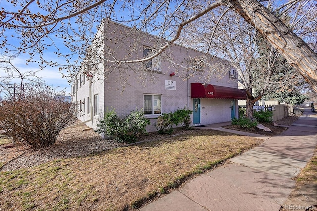 view of front of home with brick siding