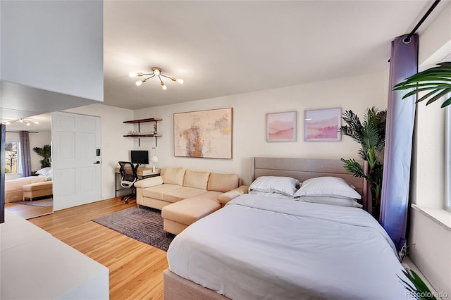 bedroom featuring light wood-style flooring