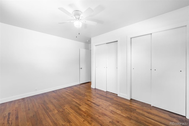 5167 S Pearl St, Littleton, CO 80121 - unfurnished bedroom with two closets, wood finished floors, and ceiling fan