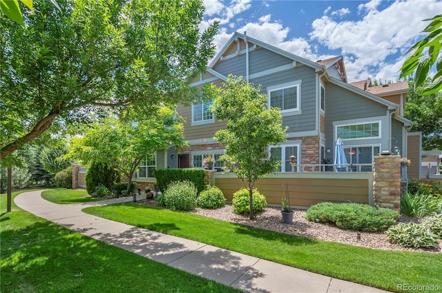 14300 Waterside Ln Unit E3, Broomfield, CO 80023 - view of front of house featuring stone siding