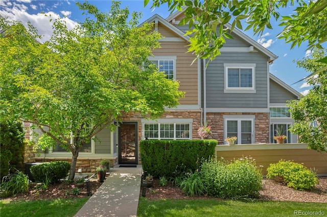 14300 Waterside Ln Unit E3, Broomfield, CO 80023 - view of front of house featuring stone siding